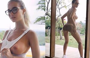 Busty blonde babe all over glasses shows off the brush amazing body