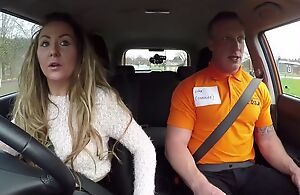 Long-haired Mummy blows her car driving instructor