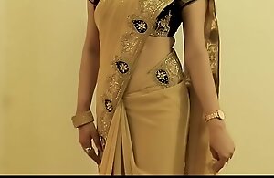 Hawt GIRL SAREE WEARING added to Resembling her NAVEL added to BACK